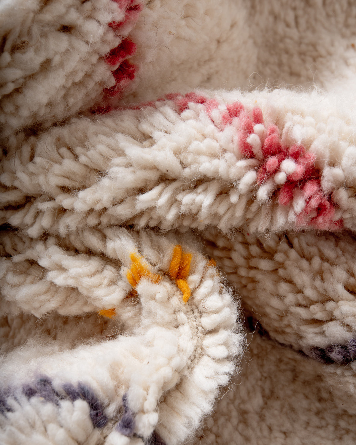 Modern, designer, handcrafted Berber rug from Morocco. Beniourain carpet with beautiful colours and patterns and fluffy wool texture.